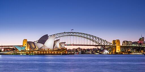 Jørn Utzon's Sydney Opera House, and the Harbour Bridge, taken at dusk from Macquarie's Point...
