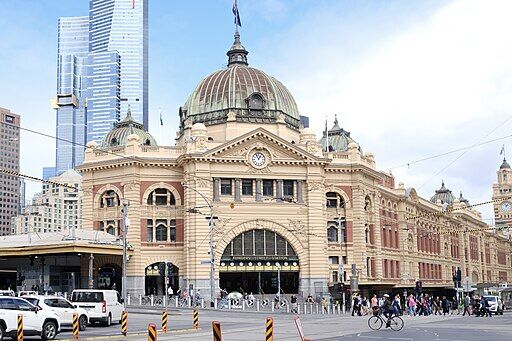 Flinders Street Station in Melbourne with Eureka Tower and Australia 108 visible.